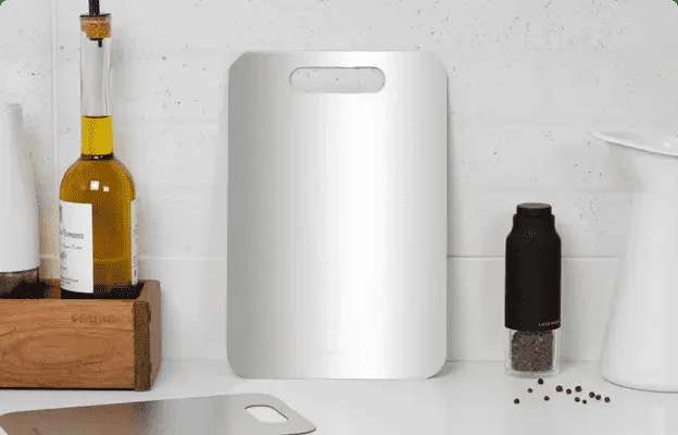 Titanium cutting board on a clean kitchen counter